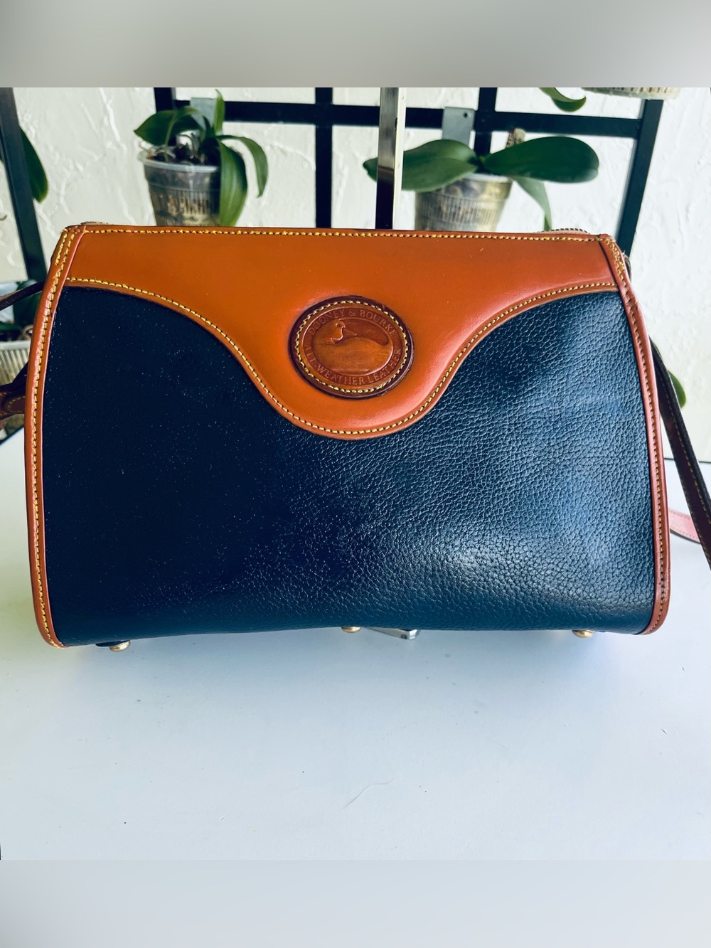 VINTAGE DOONEY AND BOURKE NAVY AND TAN CROSSBODY BAG